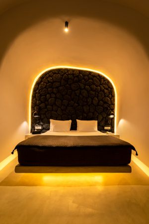 nostos-apartments-luxury-bedroom-bed-interior-cave-house (3)